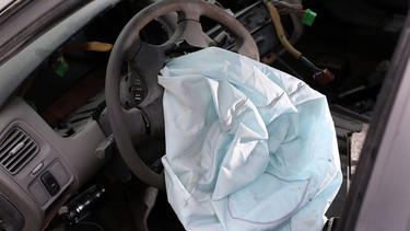 A deployed airbag is seen in a 2001 Honda Accord at the LKQ Pick Your Part salvage yard on May 22, 2015 in Medley, Florida. The largest automotive recall in history centers around the defective Takata airbags that are found in millions of vehicles not limited to just one automaker.