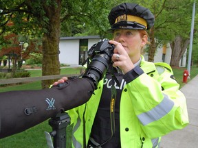 Constable Melissa Wutke of the RCMP looks for people texting in their cars in British Columbia with a camera and a high-powered lens.