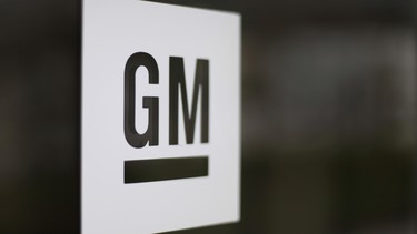 FILE - This Friday, May 16, 2014, file photo, shows the General Motors logo at the company's world headquarters in Detroit. The automaker will be adding 700 new engineering jobs in Ontario.