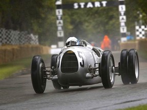 Pink Floyd drummer Nick Mason behind the wheel of the 1936 Auto Union Type C at Goodwood Festival of Speed.