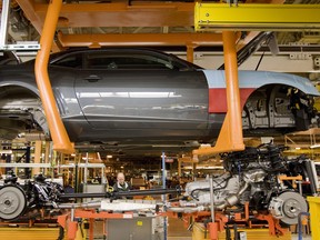 This 2009 file photo shows a Chevrolet Camaro on General Motors' flex line at its Oshawa, Ontario plant.
