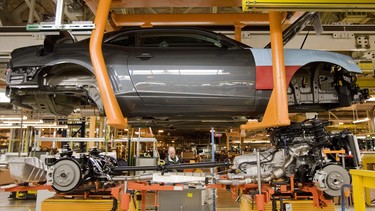 This 2009 file photo shows a Chevrolet Camaro on General Motors' flex line at its Oshawa, Ontario plant.