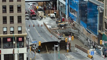 A large portion of Rideau Street in downtown Ottawa, Ontario is seen caved in, causing a massive sinkhole that knocked out power to the majority of the downtown area on June 8, 2016.       The massive sinkhole formed next to a shopping mall in downtown Ottawa, caused a gas leak and forced the evacuation of all nearby businesses.