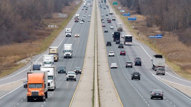 Traffic moves along Highway 401 at the Dorchester Road interchange in London, Ont. on Wednesday November 18, 2015.