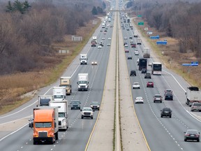 Traffic moves along Highway 401 at the Dorchester Road interchange in London, Ont. on Wednesday November 18, 2015.