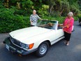 Former B.C. Solicitor General and Attorney General Russ Fraser holds the first collector vehicle license plate. Jone Fraser has owned her Mercedes Benz 450SL since buying it new in 1980.