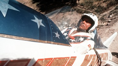 In this Sept. 8, 1974, file photo, Evel Knievel sits in the steam powered rocket motorcycle that will hopefully take him across Snake River Canyon in Twin Falls, Idaho.