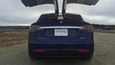 With falcon-wing doors opened, the Model X looks poised for flight. And no, Elon Musk hasn’t revealed that option. Yet.