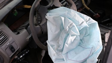 A deployed airbag is seen in a 2001 Honda Accord. The largest automotive recall in history centres around the defective Takata airbags that are found in millions of vehicles manufactured by BMW, Chrysler, Daimler Trucks, Ford, General Motors, Honda, Mazda, Mitsubishi, Nissan, Subaru and Toyota.