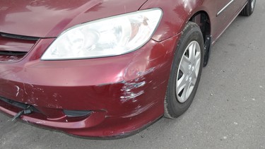 While not held together with duct tape, this kind of mild bumper skin or fascia damage could likely be repaired instead of replaced. With modern safety systems and sensors now embedded in bumper skins it's important they're properly aligned for everything to work as it should.