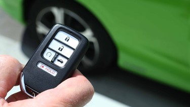 The key fob, which includes remote start, is shown on a 2016 Honda Civic.