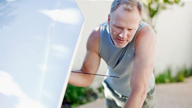 Man changing oil