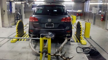 In this Oct. 13, 2015, file photo, a Volkswagen Touareg diesel is tested in the Environmental Protection Agency's cold temperature test facility in Ann Arbor, Mich. A Volkswagen engineer pleaded guilty Friday, Sept. 9, 2016, to one count of conspiracy in the company's emissions cheating scandal. James Robert Liang, of Newberry Park, Calif., entered the plea in U.S. District Court in Detroit.