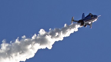 Stuntman Eddie Braun flies the "Evel Spirit" rocket on Friday, Sept. 16, 2016, over the Snake River Canyon at Twin Falls, Idaho.