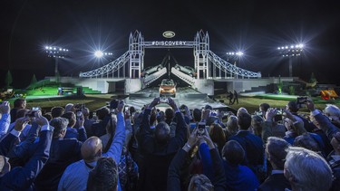 Guests take photographs during the launch of Land Rover's new Discovery at Packington Hall.