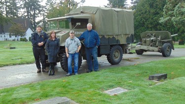 (Left to right) Wartime general service truck owner Harry Moon with Surrey cemeteries coordinator Anna Christian, military collector Dean Fraser and Canadian Military Education Centre president Gord Wolzencroft alongside the historic anti-tank gun.