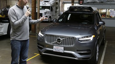 In this photo taken Tuesday, Dec. 13, 2016, Anthony Levandowski, head of Uber's self-driving program, speaks about their driverless car in San Francisco.