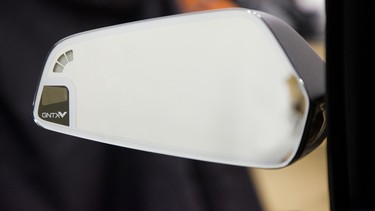 Seemingly unknown mirror company Gentex has found a solution where rear-view cameras and mirrors peacefully coexist.