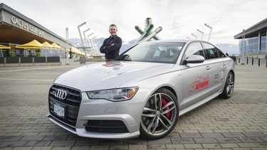 Vancouver auto show Executive Director Jason Heard with the show promo car, a 2017 Audi S7, at Jack Poole Plaza.