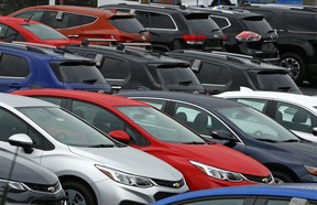 This Jan. 12, 2017 photo shows Chevrolet cars on a dealer lot in.