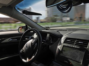 An autonomous car controlled by a Nvidia DRIVE PX 2 AI car computing platform drives along a course during CES International in Las Vegas.