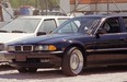 In this Sept. 8, 1996, file photo, a black BMW 750iL riddled with bullet holes is seen in a Las Vegas police impound lot. Rapper Tupac Shakur was shot while riding in the car driven by Death Row Records chairman Suge Knight on Sept. 7, 1996, and died six days later. The car was listed for sale for $1.5 million on Feb. 21, 2017, by a California memorabilia dealer.