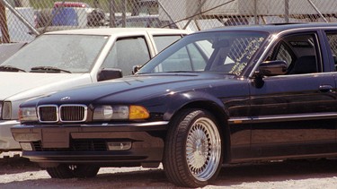 In this Sept. 8, 1996, file photo, a black BMW 750iL riddled with bullet holes is seen in a Las Vegas police impound lot. Rapper Tupac Shakur was shot while riding in the car driven by Death Row Records chairman Suge Knight on Sept. 7, 1996, and died six days later. The car was listed for sale for $1.5 million on Feb. 21, 2017, by a California memorabilia dealer.