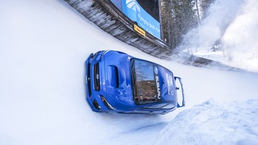 Mark Higgins taking a modified Subaru WRX STi down a bobsled run.