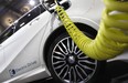 A Mercedes electric car is plugged for charging during the second press day of the 66th IAA auto show in Frankfurt in 2015.
