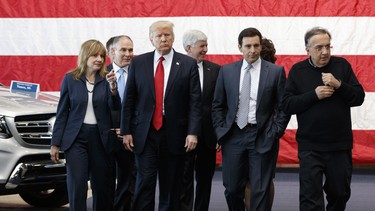 President Donald Trump tours the American Center of Mobility, Wednesday, March 15, 2017, in Ypsilanti Township, Mich. From left are, GM CEO Mary Barra, EPA administrator Scott Pruitt, Trump, Michigan Gov. Rick Snyder, Ford CEO Mark Fields, and Fiat Chrysler CEO Sergio Marchionne.