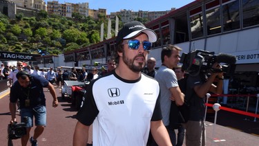 McLaren Honda's Spanish driver Fernando Alonso in the pit lane of the Monaco Formula One street circuit during the 2015 Monaco F1 Grand Prix.