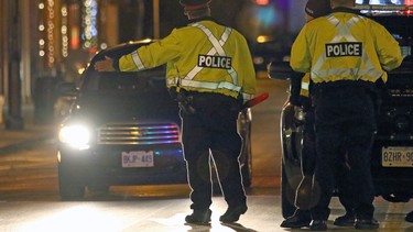 Police conducting a RIDE program through the streets of Port Hope, Ont.