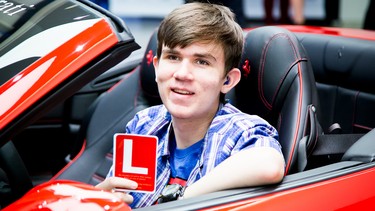 Superteen Andrew Westerlund proudly displays his recently acquired 'L' as he sits behind the wheel of the Ferrari he will be using in tomorrow's Diamond Rally up the Sea to Sky Highway.