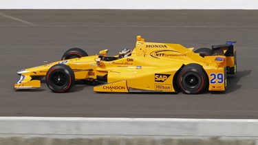 Race driver Fernando Alonso of Spain drives down the front straightaway at the Indianapolis Motor Speedway in Indianapolis, Wednesday, May 3, 2017.