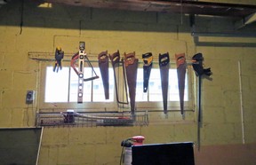 A plethora of hand saws adorn the walls of Lorraine Sommerfeld’s garage.