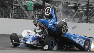 Scott Dixon collides with Jay Howard during this past weekend's Indy 500 race at Indianapolis Motor Speedway. Both drivers miraculously walked away from the crash.