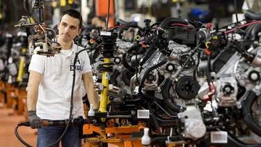 A line of engines awaits cars coming down the line at the Chrysler assembly plant in Brampton, Ontario.