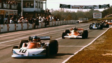 Ronnie Peterson leads James Hunt during the 1976 Canadian Grand Prix at Mosport.