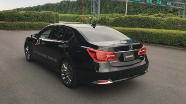 A drive in Honda's experimental autonomous cars at the company's proving grounds in Tochigi, Japan.