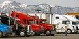 Trucks park at a truck stop near Hesperia, California.