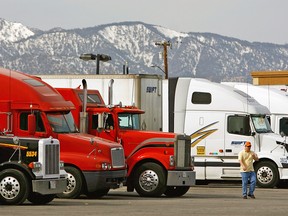 Trucks park at a truck stop near Hesperia, California.