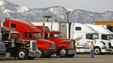 Trucks park at a truck stop near Hesperia, California.