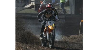 Pro rider Mike Aranda aboard the all-electric Redshift MX at the Red Bull Rocks and Logs endurocross event at the Wild Rose Motocross Park.