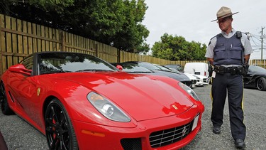 RCMP show the media seven of 13 high performance cars impounded at Bayveiw Towing in Surrey in 2011. Thirteen high-end cars were impounded for racing  along Highway 99 on Wednesday.