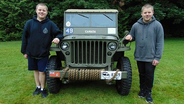 Identical twins Cameron and Sean Black of Port Moody, B.C. with the World War Two Jeep they have restored over the past five years.