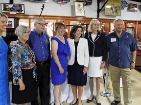 From right to left: Jim Sandora of the Buffalo Transportation Museum, former Ford of Canada CEO Dianne Craig, New York State Lieutenant Governor Kathy Hochul, Joann Villeneuve and representatives of other inductees into the Women’s Transportation Hall of Fame.