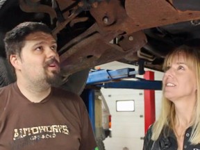 Chris Muir, left, and Lorraine Sommerfeld explain what mechanics look for in vehicle inspections.