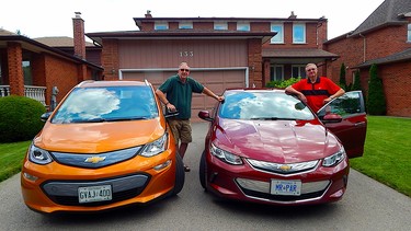 Brian Harper with the Chevrolet Bolt, left, and his brother Rick with his Chevrolet Volt.
