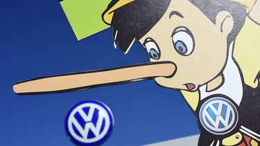 A Pinocchio placard from members of Greenpeace as they protest outside the main gate at Volkswagen Headquarters on September 25, 2015 in Wolfsburg, Germany.