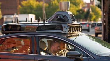 An Uber driverless Ford Fusion drives down Smallman Street on September, 22, 2016 in Pittsburgh, Pennsylvania.